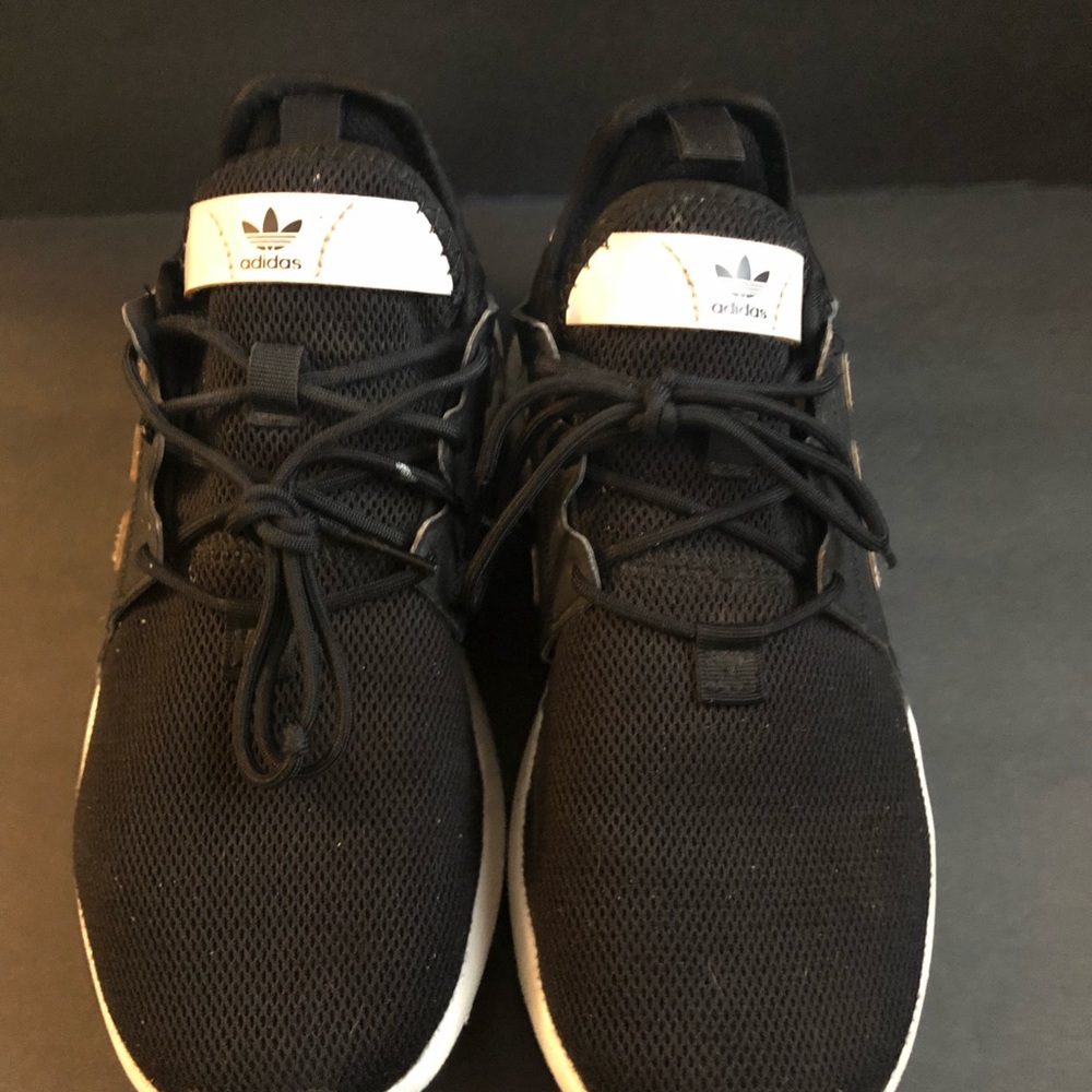 Girls Adidas shoes.